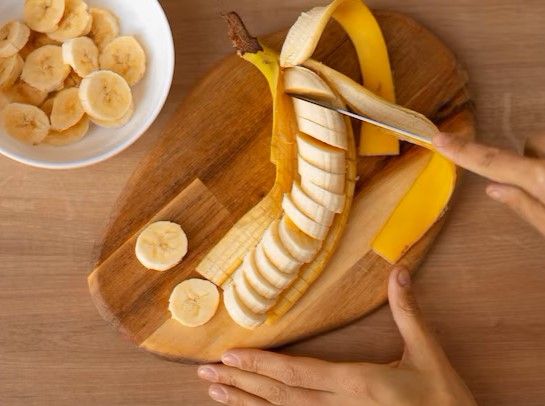 top-view-cut-banana-on-wooden-board_23-2150241119.jpeg.jpg